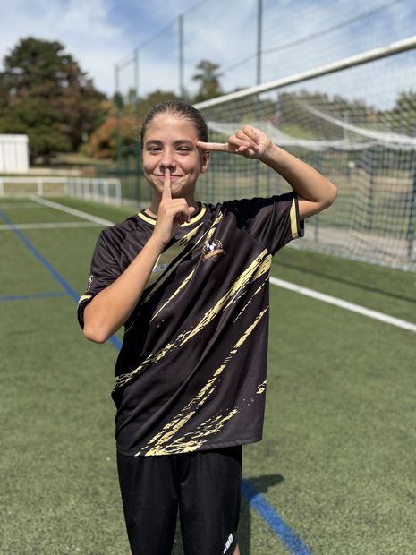 Joueuse posant sur le terrain